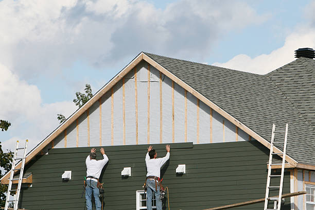 Professional Siding technician working in Takoma Park, MD